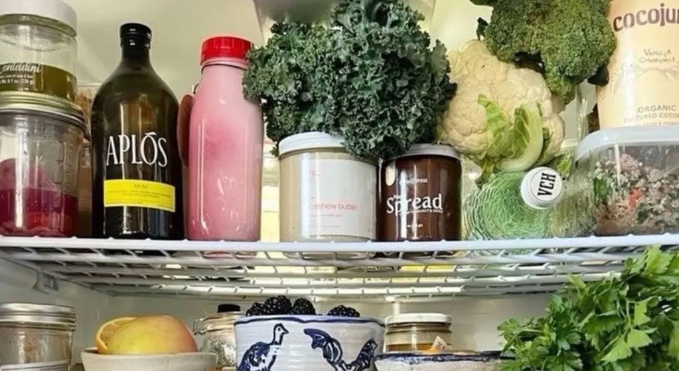 Organised fridge, glass containers of prepped food