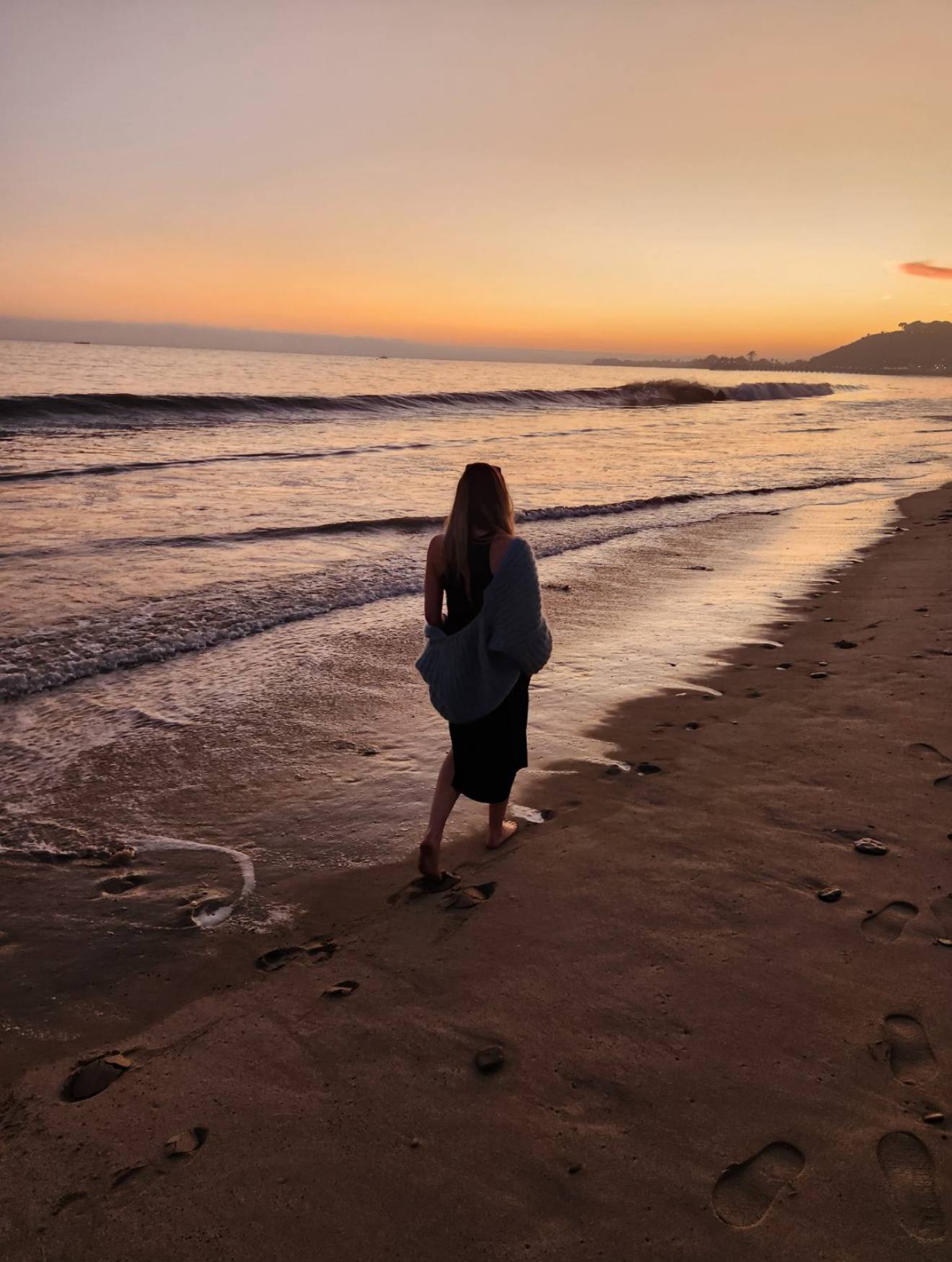 Walking the beach at sunset